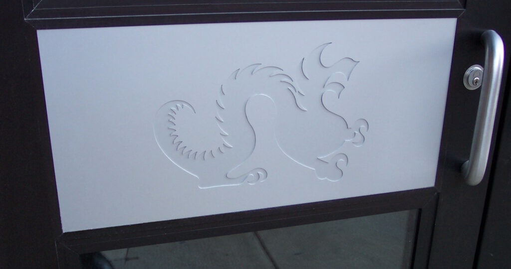 A dragon-adorned door with added versatility.