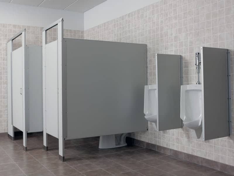 A group of urinals in a public restroom.