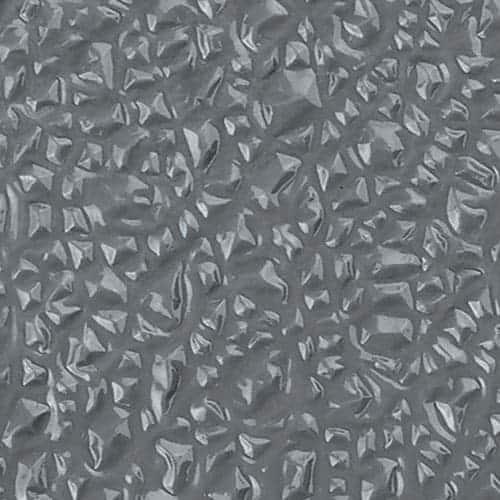 A close up image of a gray metal surface.