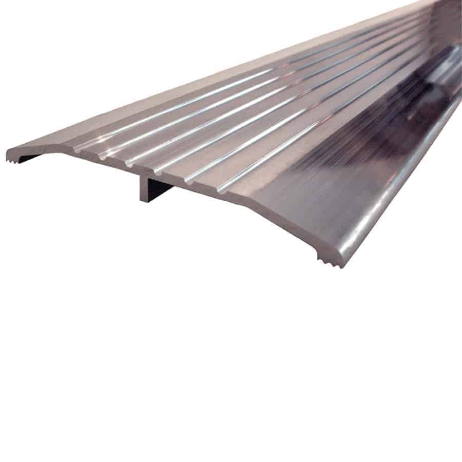 A metal stair tread with a slanted edge.