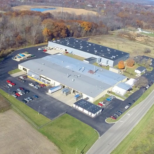 An aerial view of a large industrial building.