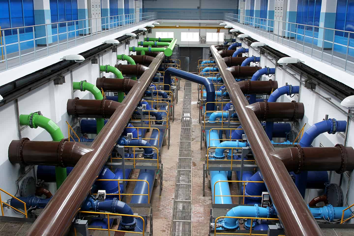 A water treatment plant featuring blue and green pipes made of SpecLite3® FRP.