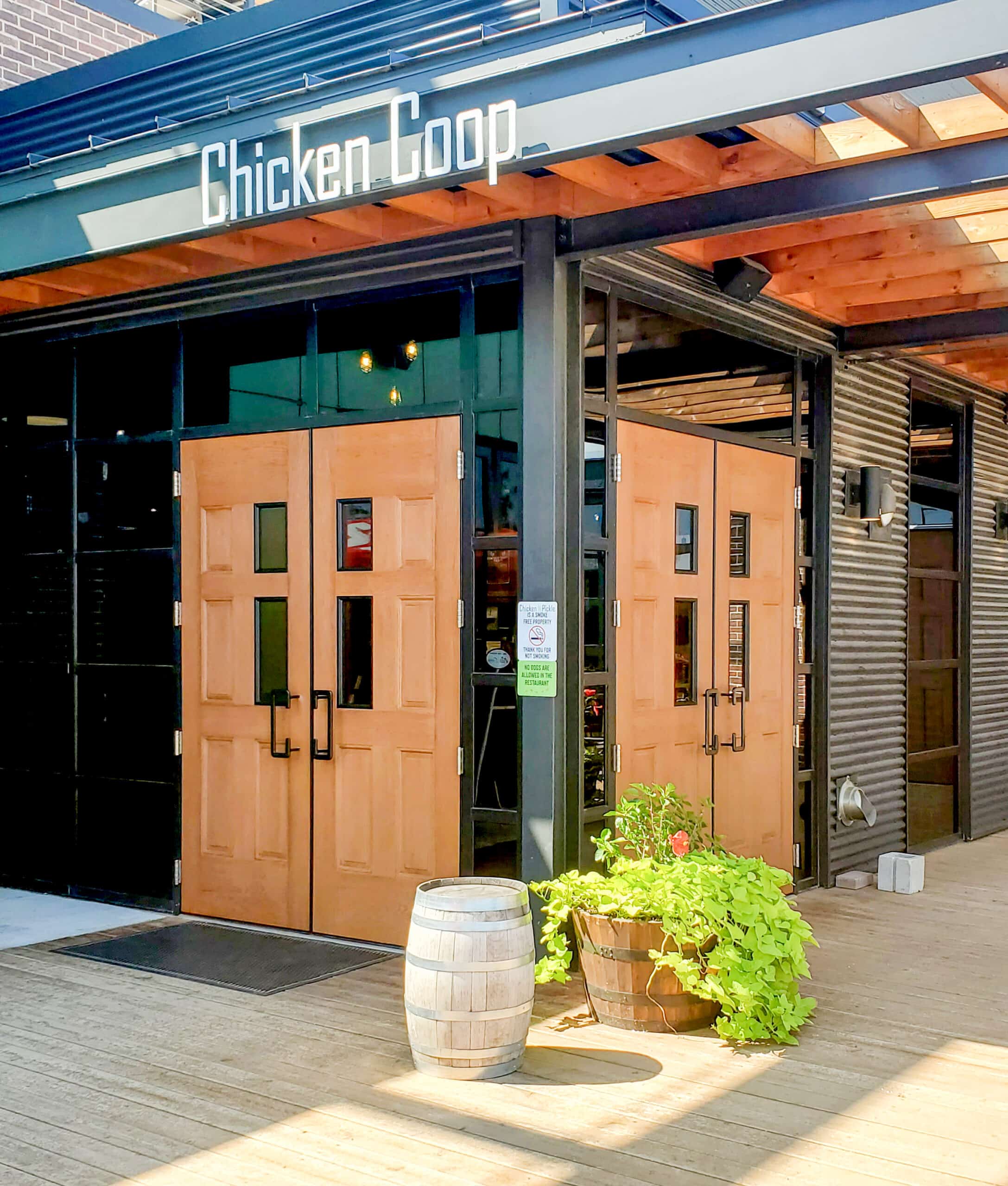 A photo of the exterior doors at Chicken Coop. 