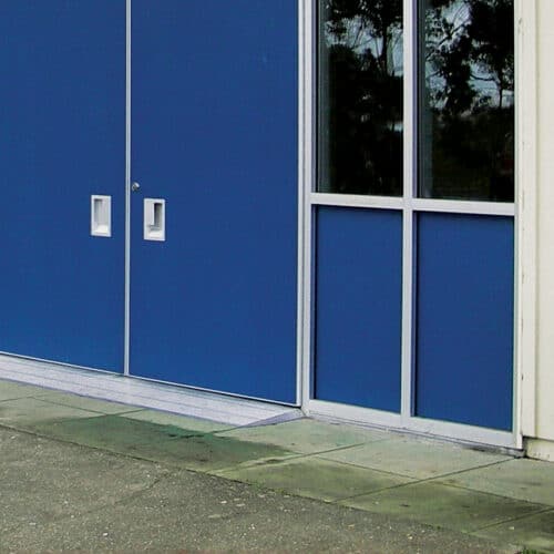 An SL-36 aluminum architectural panel adorned with a blue door and a white handle.