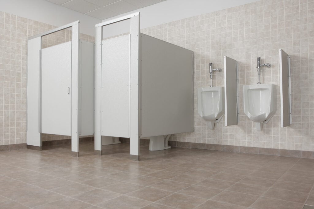 Three stalls in a bathroom.