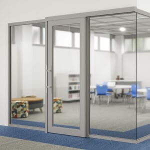 A glass door in an office with a blue carpet.