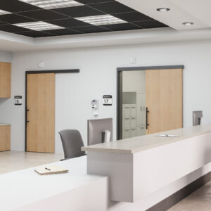 A reception area with a desk and chairs.