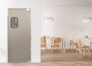 A modern room with light wood flooring includes tables and chairs. On the left, a closed door with a small window occupies part of the wall. Two cloud-shaped pendant lights hang from the ceiling.