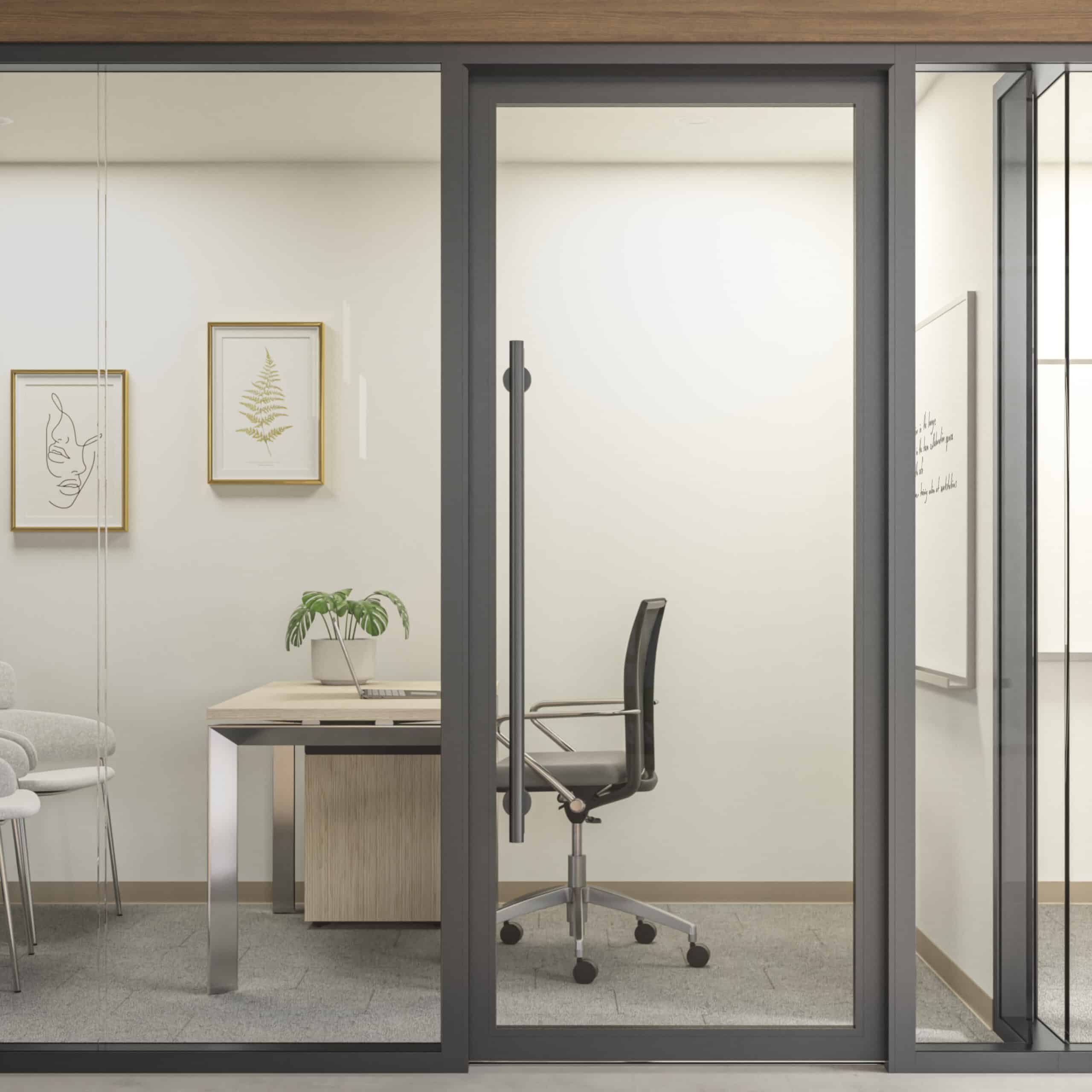 A modern office with glass partition walls with enhanced privacy, featuring a desk, a black office chair, a potted plant, two framed pictures, and a whiteboard.