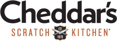 Cheddar’s Scratch Kitchen logo features crossed knives and "Est 1979" between "Scratch" and "Kitchen," representing a tradition you can trust—just like our national account commercial door solutions.