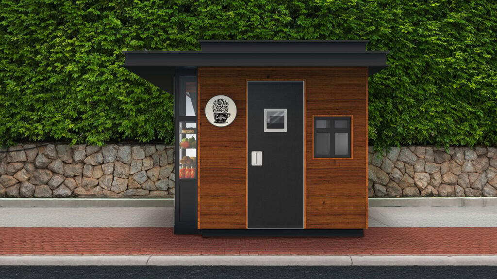 Small modern wooden kiosk featuring a black national account commercial door and window, located on a sidewalk with a stone wall and green hedge in the background.
