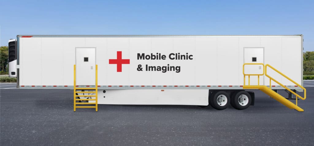 A white mobile clinic trailer with a red cross and the words "Mobile Clinic & Imaging," featuring yellow stairs at two doors, parked on asphalt—ideal for OEM Account Solutions for Modular and Prefabricated Mobile Facilities.